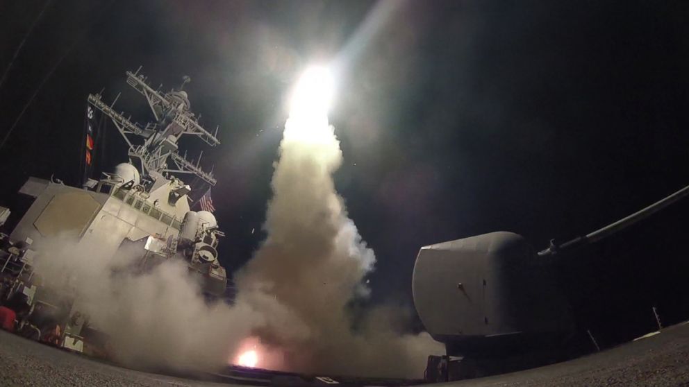 PHOTO: In this handout provided by the U.S. Navy,The guided-missile destroyer USS Porter fires a Tomahawk land attack missile at a Syrian military airfield in retaliation for a chemical attack that killed civilians, April 7, 2017. 