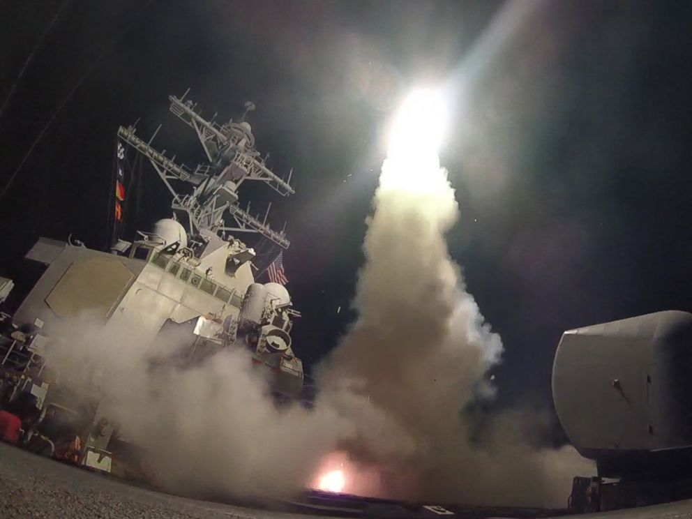 PHOTO: In this handout provided by the U.S. Navy,The guided-missile destroyer USS Porter fires a Tomahawk land attack missile at a Syrian military airfield in retaliation for a chemical attack that killed civilians, April 7, 2017.