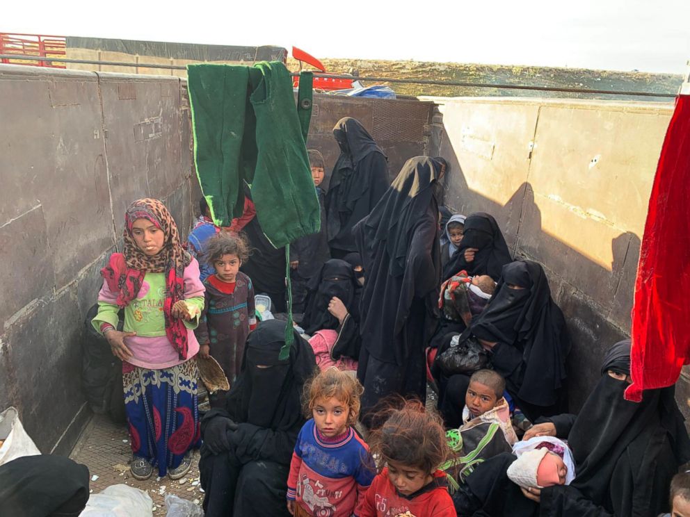 PHOTO: Children and women continued to emerge from ISIS's final holdout in Baghouz, Syria, as fighting raged on March 13, 2019.