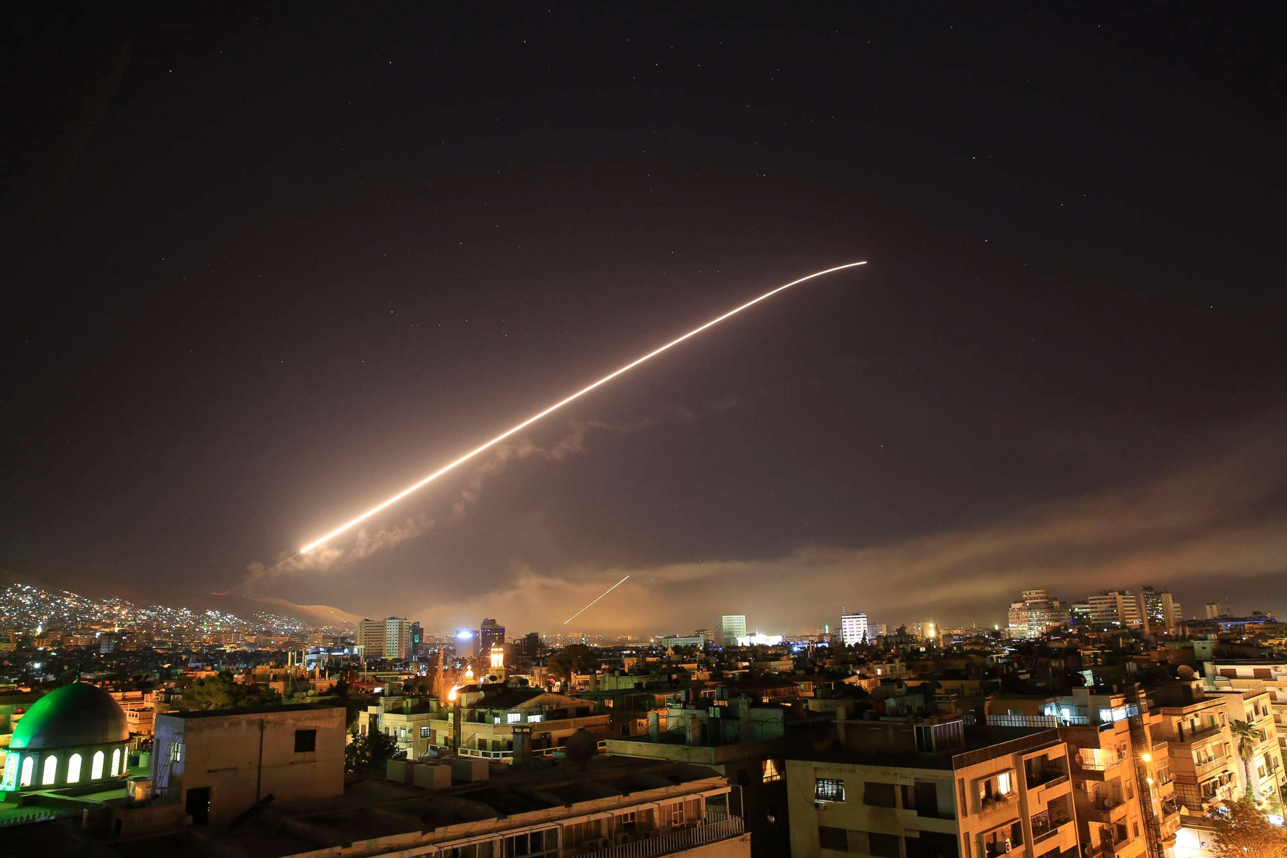 PHOTO: Damascus sky lights up with missile fire as the U.S. launches an attack on Syria targeting different parts of the Syrian capital Damascus, Syria, early Saturday, April 14, 2018.