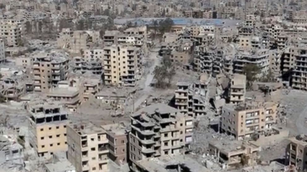 PHOTO: This Oct. 19, 2017 made from drone video shows damaged buildings in Raqqa, Syria two days after Syrian Democratic Forces said that military operations to oust the Islamic State group have ended.