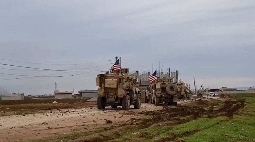 PHOTO: A convoy of U.S military vehicles moves in the village of Khirbet Amo, near Qamishli, Syria, Feb. 12, 2020.