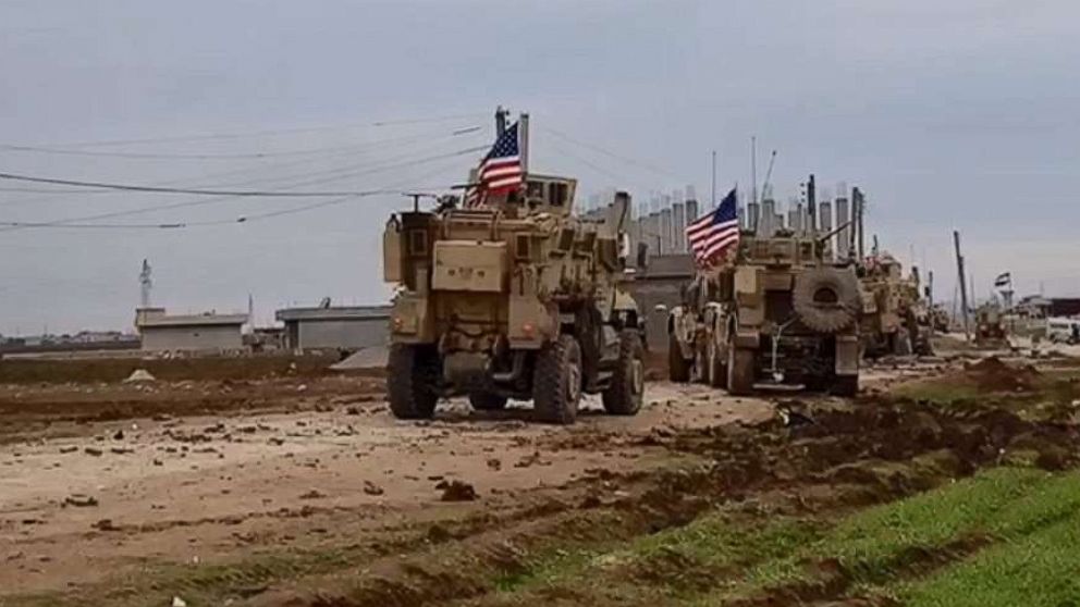 PHOTO: A convoy of U.S military vehicles moves in the village of Khirbet Amo, near Qamishli, Syria, Feb. 12, 2020.