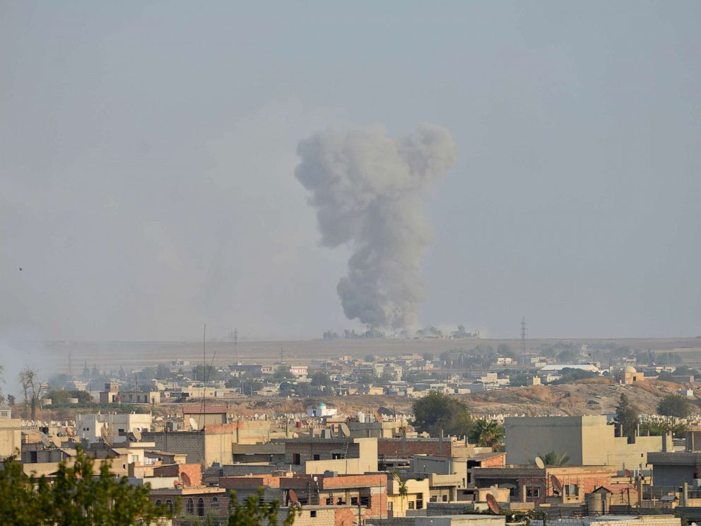 PHOTO: Smoke rises from the Syrian border town of Ras al-Ain as it is pictured from the Turkish town of Ceylanpinar in Sanliurfa province, Turkey, Oct. 9, 2019.