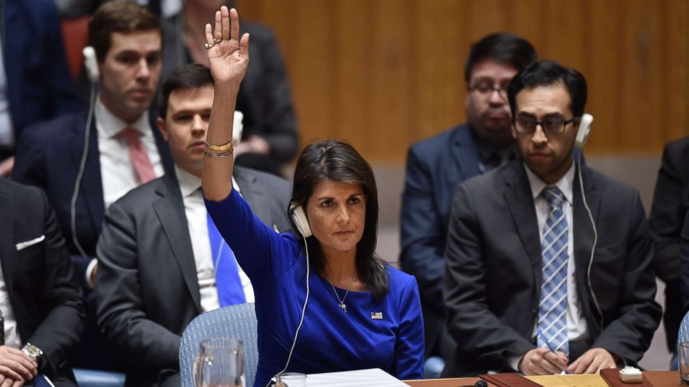 PHOTO: US Ambassador to the UN Nikki Haley votes during a UN Security Council meeting on the situation in Syria, at the United Nations Headquarters in New York, April 14, 2018.

