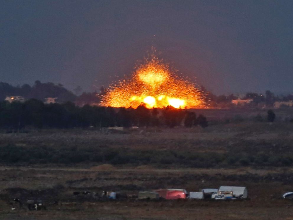 PHOTO: An explosion caused by aerial bombardment across the border in Syria, during air strikes backing a Syrian-government-led offensive in the southwestern province of Daraa, July 23, 2018.