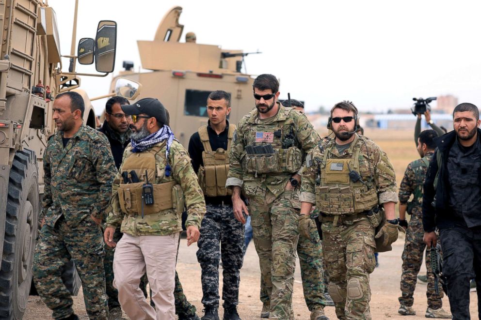 PHOTO: Syrian Democratic Forces and U.S. troops conduct a patrol near Turkish border in Hasakah, Syria, Nov. 4, 2018.