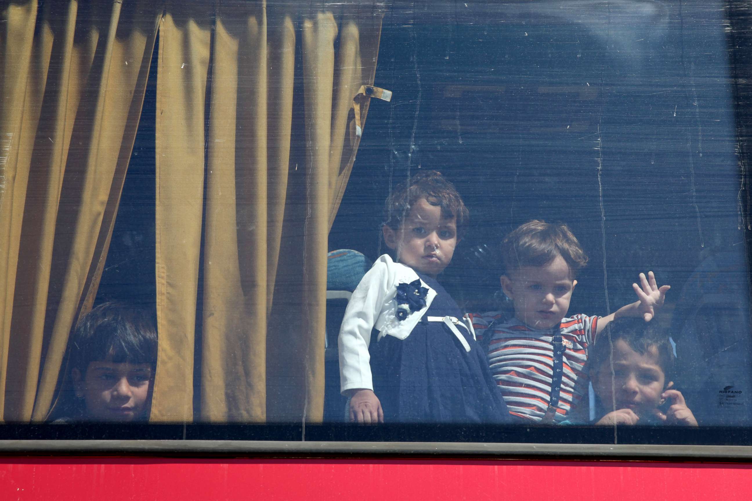 PHOTO: Syrian refugee children are seen on a bus at the Kokkinotrimithia refugee camp outside Nicosia, Cyprus, Sept. 10, 2017.