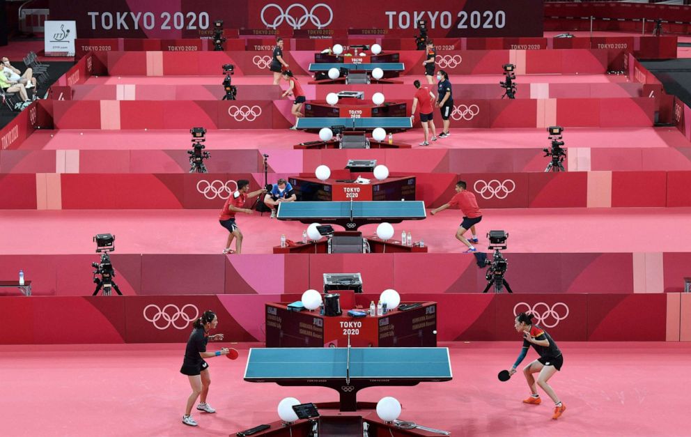 PHOTO: Table tennis players practice during a table tennis training session at the Tokyo Metropolitan Gymnasium, in Tokyo, on July 21, 2021, ahead of the Tokyo 2020 Olympic Games.