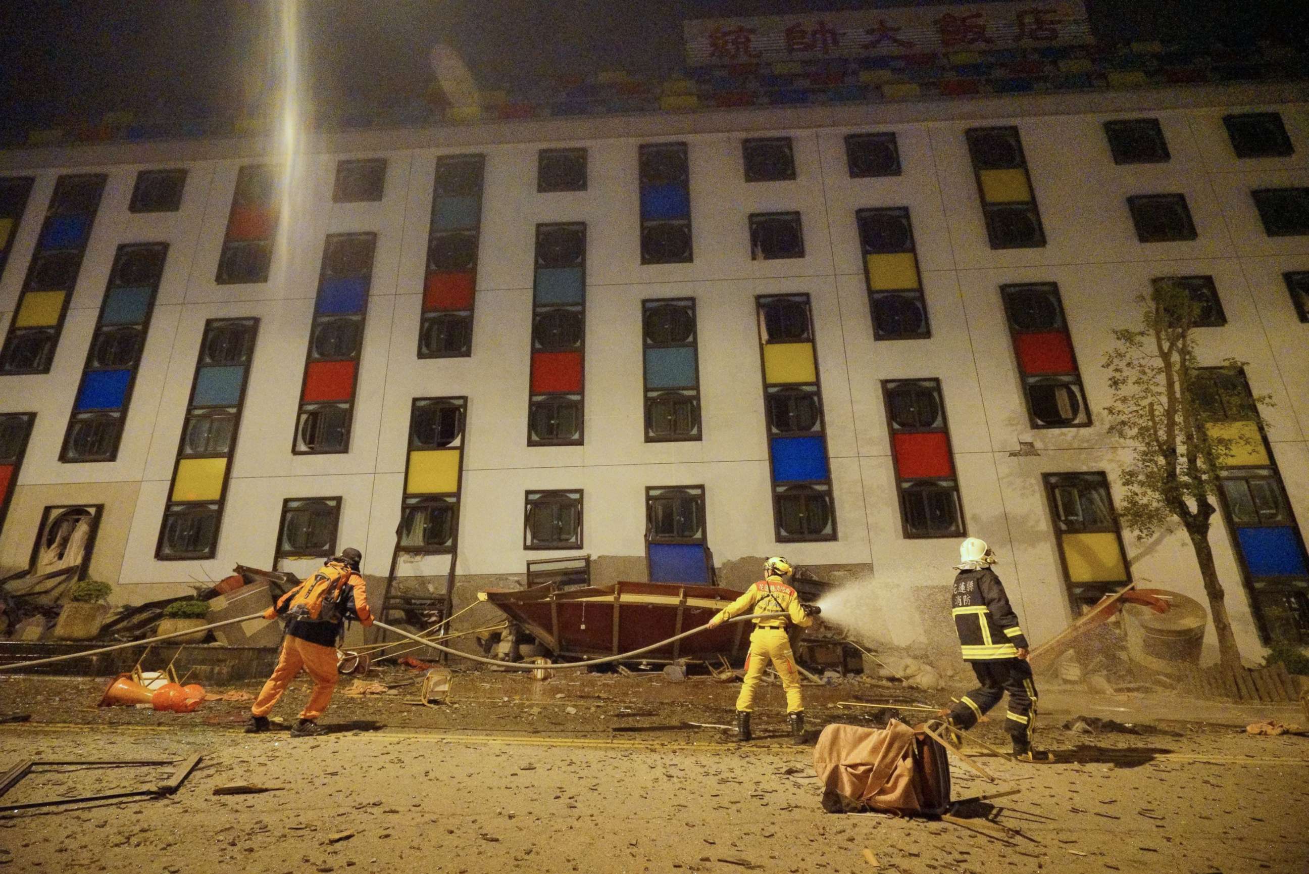 PHOTO: Rescure workers search the damaged Marshal Hotel in Hualien, eastern Taiwan, early Feb. 7, 2018, after a strong earthquake struck the island.