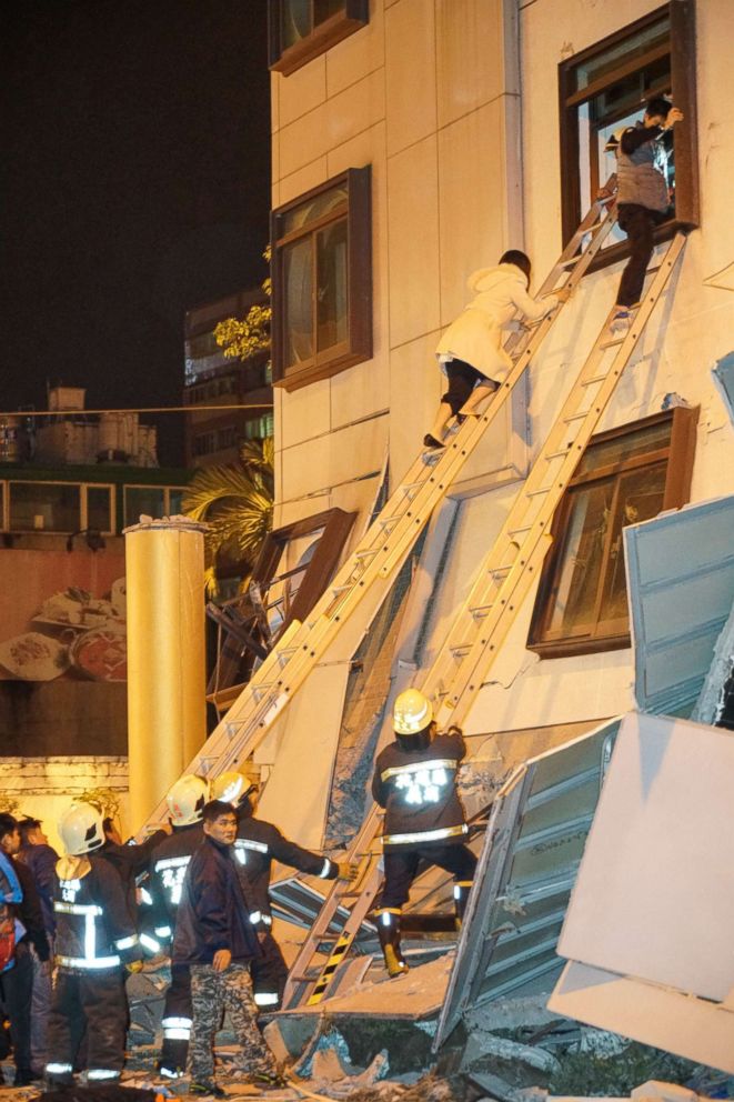 PHOTO: Customers leave the damaged Marshal Hotel in Hualien, eastern Taiwan, after a strong quake on Feb. 7, 2018.