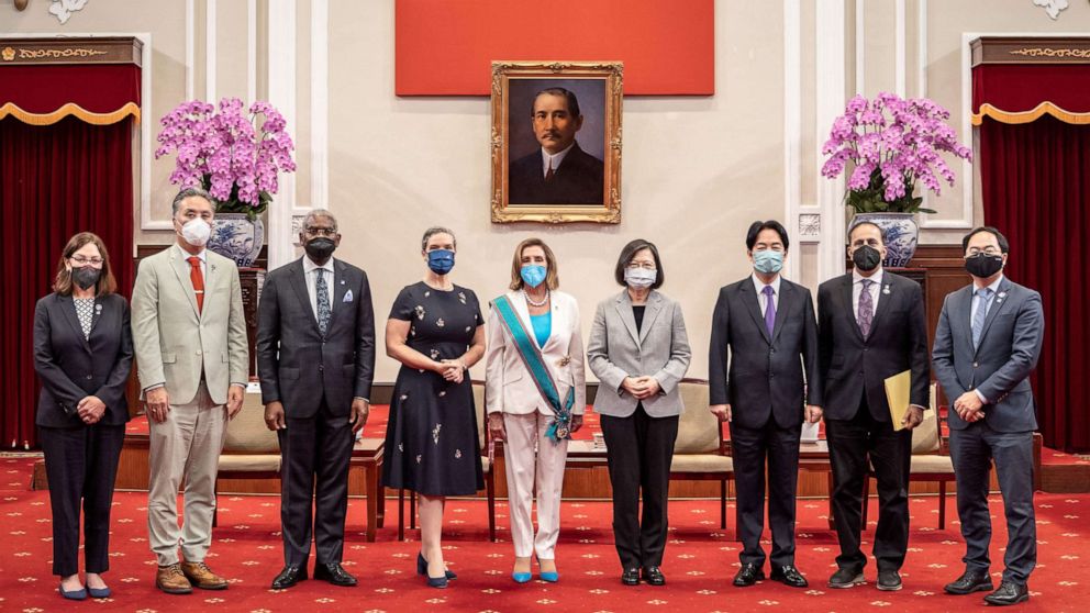 PHOTO: Speaker of the U.S. House Of Representatives Nancy Pelosi poses for photographs after receiving the Order of Propitious Clouds with Special Grand Cordon, Taiwan's highest civilian honor at the president's office in Taipei, Taiwan, Aug. 3, 2022.