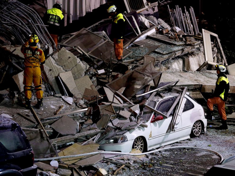 PHOTO: Rescue services search for people in a damaged building in Hualien, eastern Taiwan, Feb. 7, 2018.
