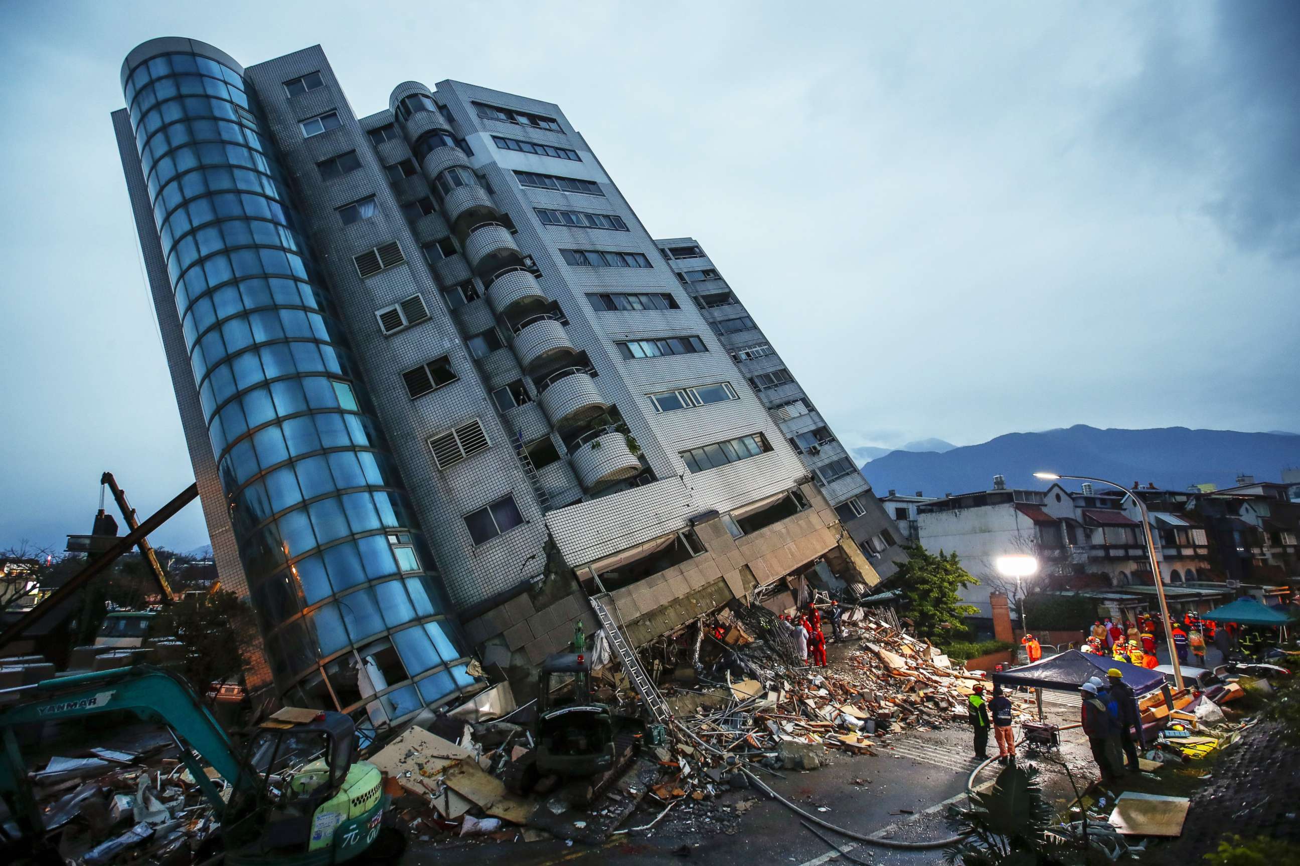 PHOTO: Rescue services search for people in a damaged building in Hualien, eastern Taiwan, Feb. 7, 2018.