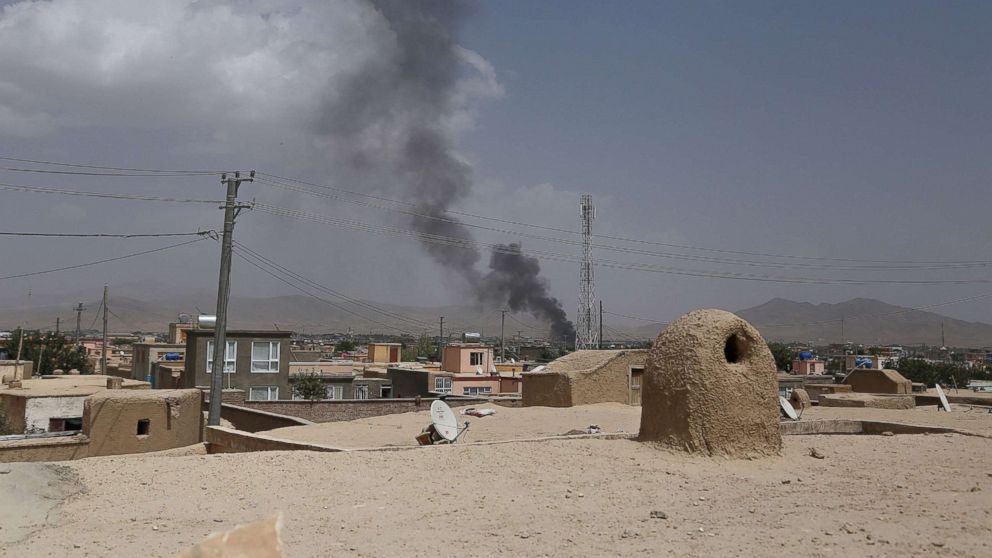Smoke rising into the air after Taliban militants launched an attack on the Afghan provincial capital of Ghazni, Aug. 10, 2018. U.S. forces launched airstrikes on Aug. 10 to counter a major Taliban assault on an Afghan provincial capital, where terrified residents cowered in their homes amid explosions and gunfire as security forces fought to beat the insurgents back.