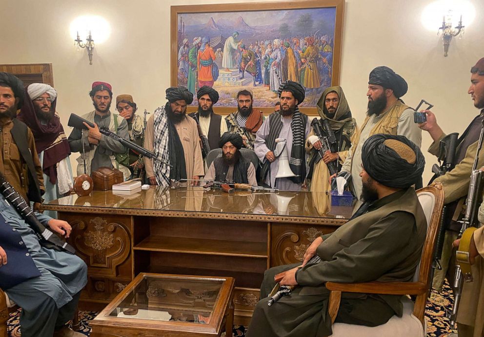 PHOTO: Taliban fighters take control of Afghan presidential palace after President Ashraf Ghani fled the country, in Kabul, Aug. 15, 2021.