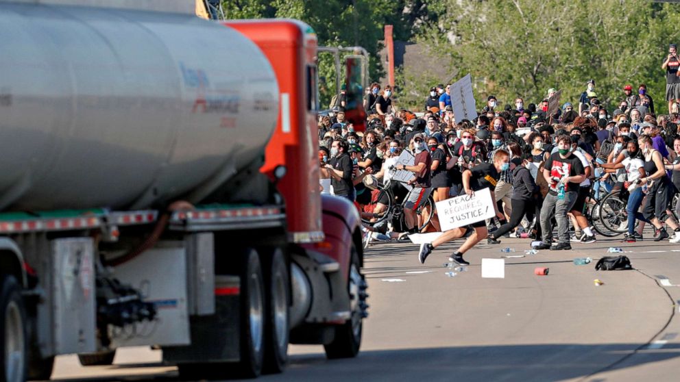 PHOTO: A tanker truck drives into thousands of protesters marching on 35W north bound highway during a protest against the death in Minneapolis police custody of George Floyd, in Minneapolis, May 31, 2020.