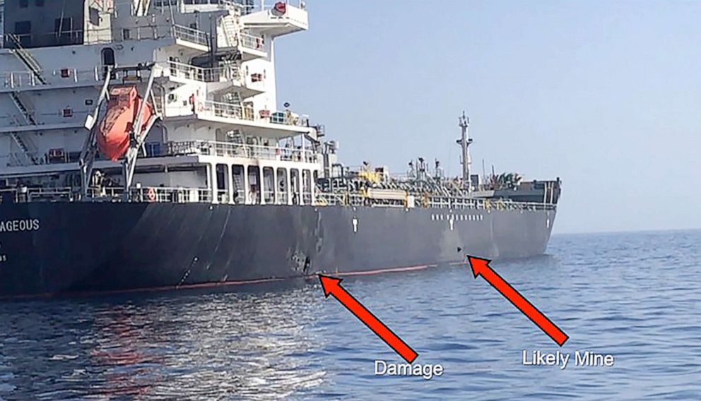 PHOTO: This handout powerpoint slide provided by U.S. Central Command damage shows an explosion and a likely limpet mine can be seen on the hull of the civilian vessel M/V Kokuka Courageous in the Gulf of Oman, June 13, 2019.