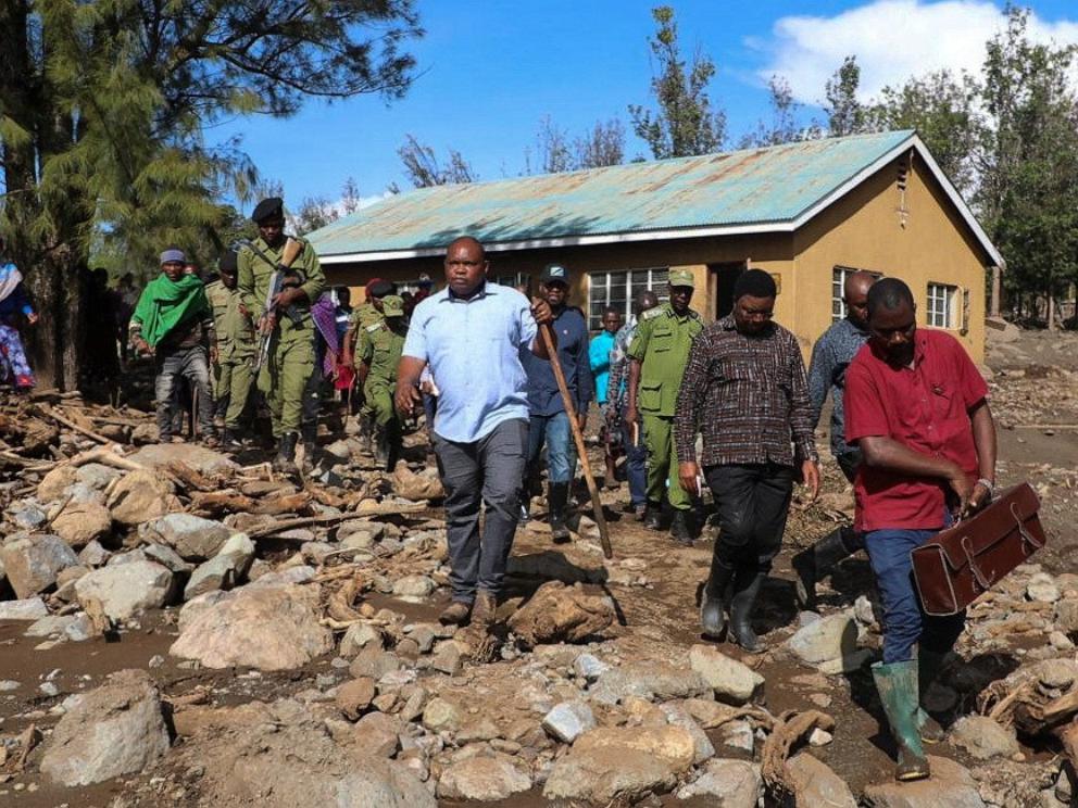 PHOTO: Tanzanian Prime Minister Kassim Majaliwa walks with members of the search and rescue mission looking for the bodies of those who were killed following floods near the slopes of Mount Hanang in the Manyara region, in Tanzania, Dec. 4, 2023.