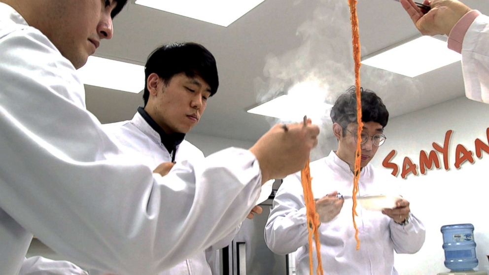 PHOTO: A team of Samyang Food researchers taste a new instant noodle in their lab.