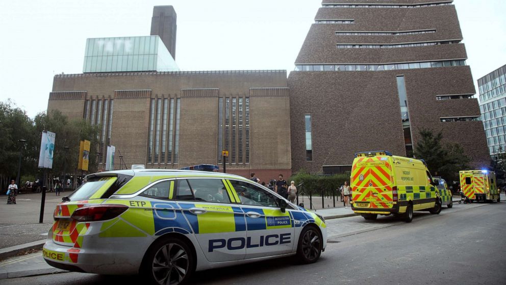 Emergency crews attend the scene at the Tate Modern art gallery, London, Sunday, Aug. 4, 2019.