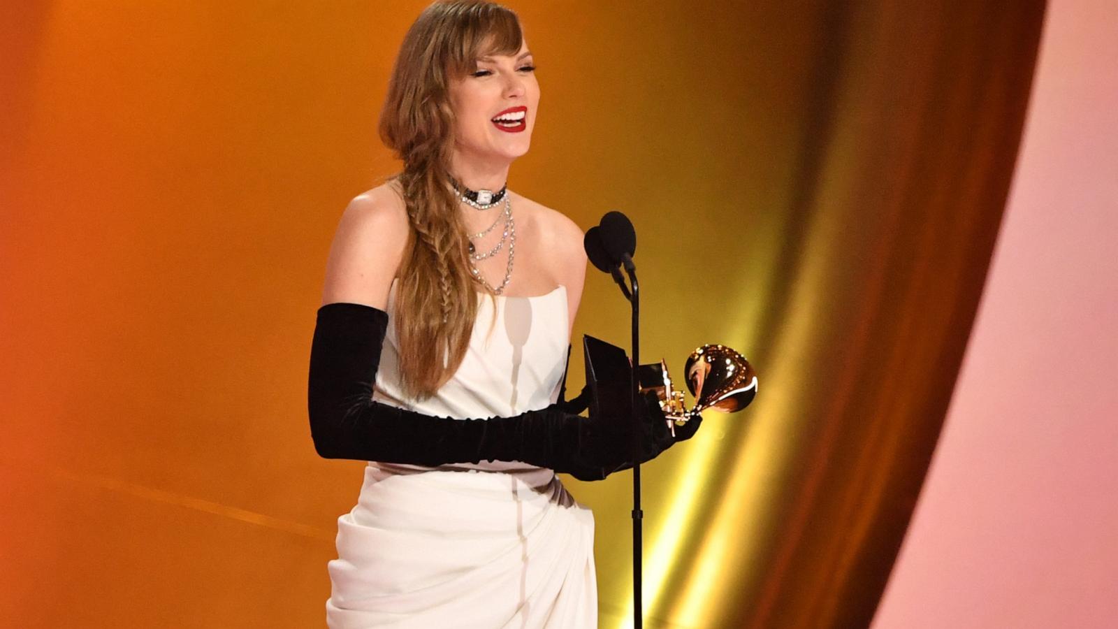 PHOTO: Taylor Swift accepts the Best Pop Vocal Album award for "Midnights" during the 66th Annual Grammy Awards in Los Angeles, Feb. 4, 2024.