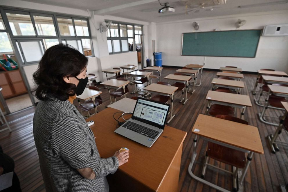 PHOTO: A teacher conducts an online class to her students at Seoul Girls' High School in Seoul, South Korea, on April 9, 2020, amid concerns over the novel coronavirus.