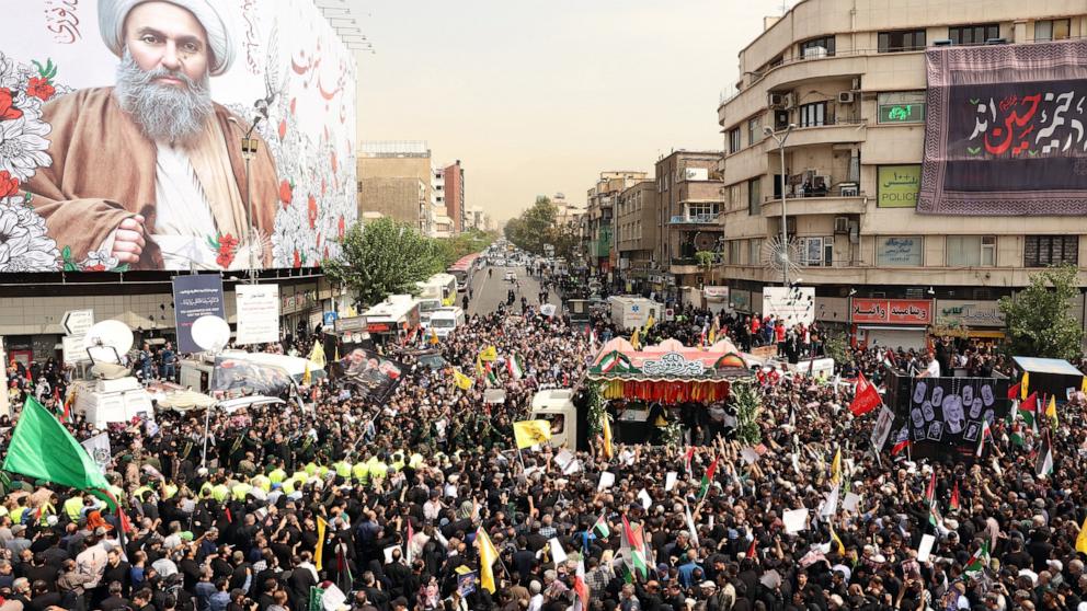 PHOTO: Iranians take part in a funeral ceremony for late Hamas leader Ismail Haniyeh, in Tehran, on August 1, 2024.