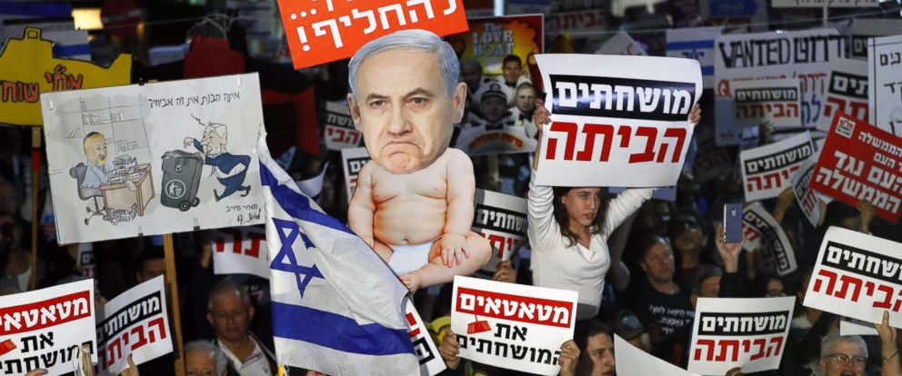 Thousands protest against Netanyahu in Tel Aviv, Jerusalem Tel-aviv-netanyahu-protest-gty-jt-171223_12x5_992