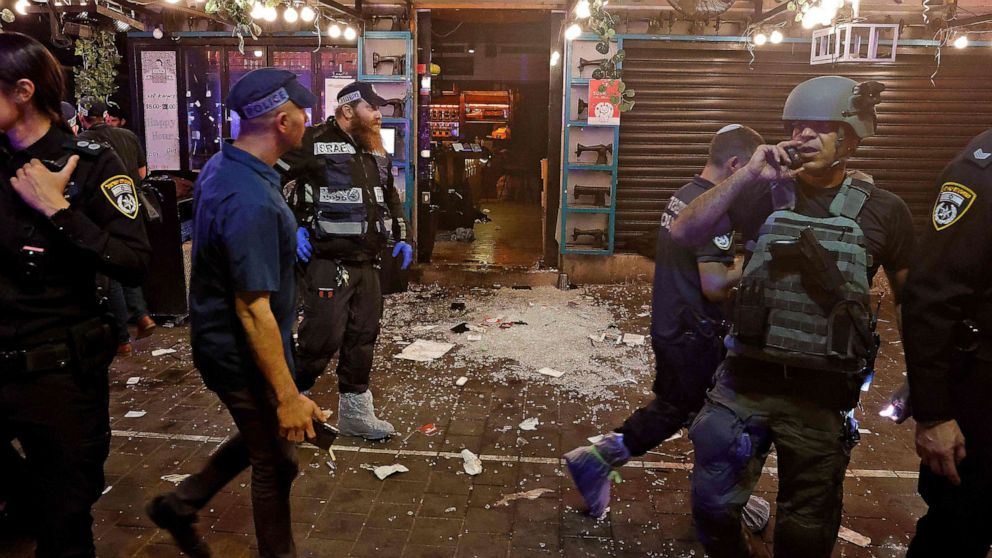 PHOTO: Police arrive at the scene in the aftermath of a shooting attack in Dizengoff Street in Tel Aviv, Israel, April 7, 2022.