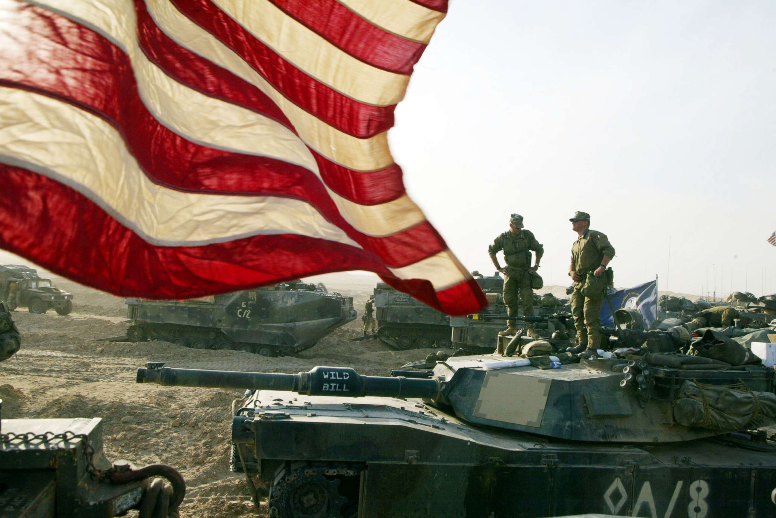 PHOTO: Marines of Task Force Tarawa prepare their vehicles, March 18, 2003, at Camp Shoup, near the Iraqi border, in Kuwait.
