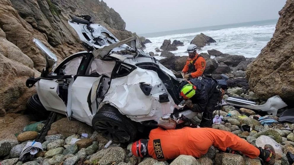 FILE PHOTO: In this photo provided by the San Mateo County Sheriff's Office, emergency personnel respond to a vehicle over the side of Highway 1 in Southern California's San Mateo County on Jan. 2, 2023.