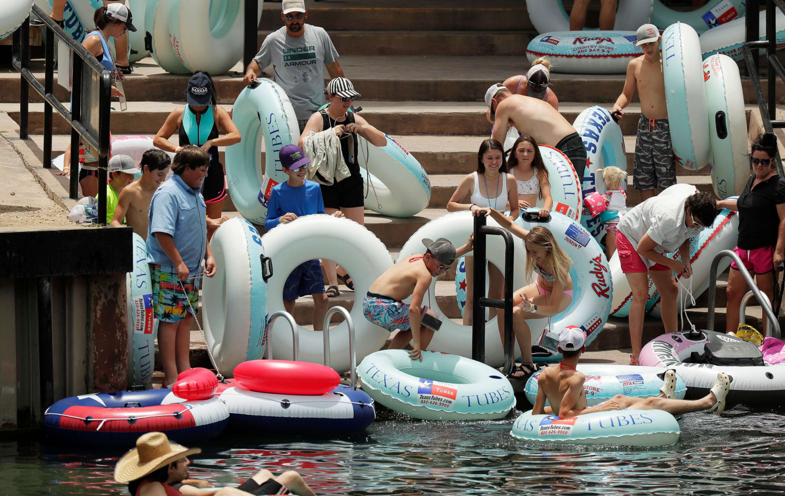 PHOTO: Tubers prepare to float the Comal River in New Braunfels, Texas despite the recent spike in COVID-19 cases in the state, June 25, 2020.