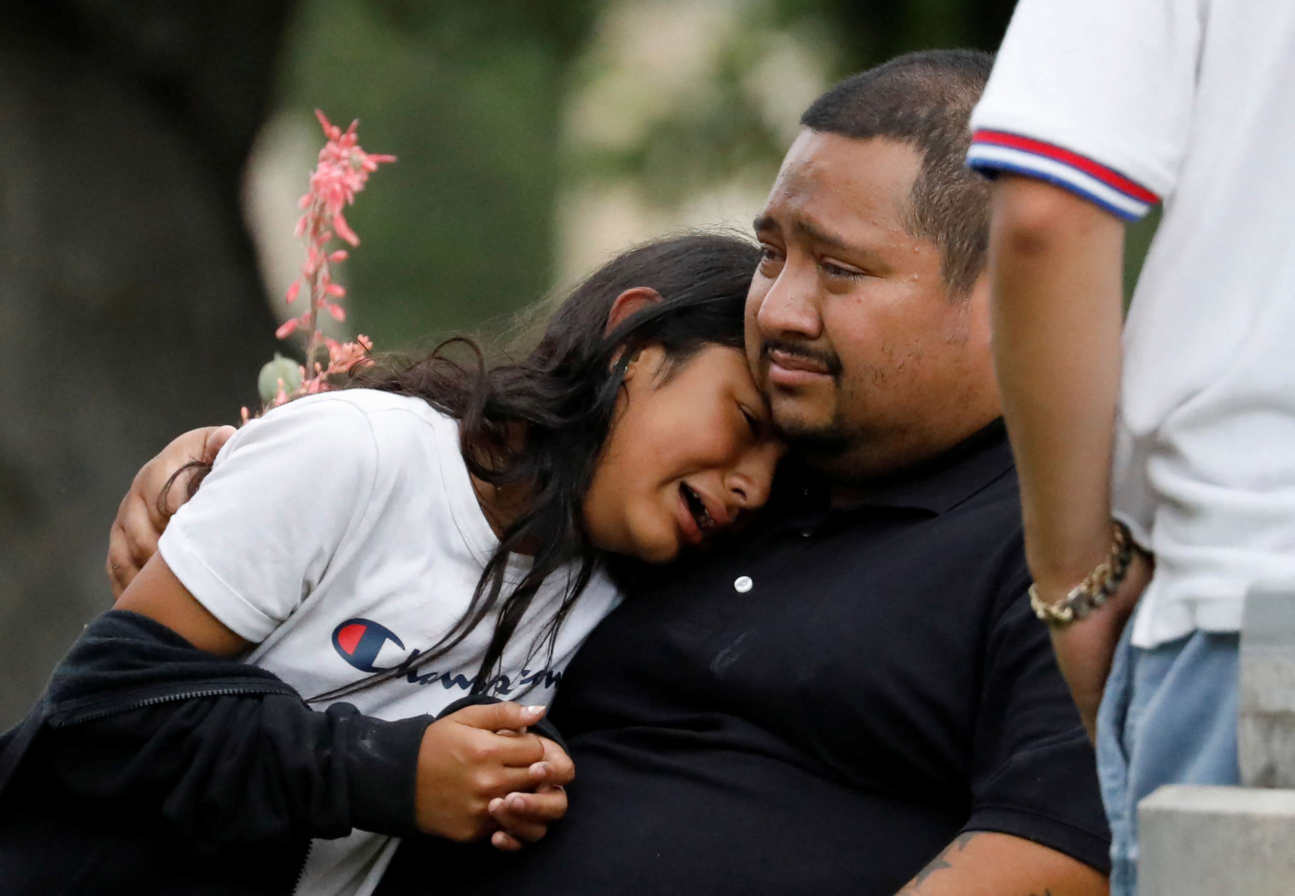 PHOTO: People react outside the Ssgt Willie de Leon Civic Center, where students had been transported from Robb Elementary School after a shooting, in Uvalde, Texas, May 24, 2022.