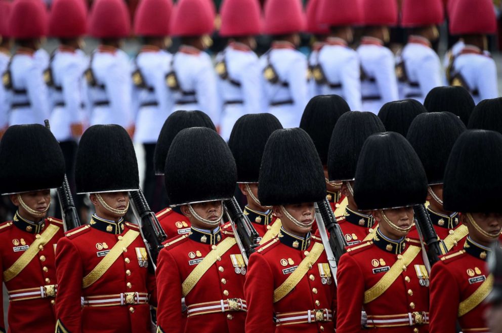 PHOTO: Thai soldiers in dress uniforms march during the funeral procession of the late Thai king Bhumibol Adulyadej  in Bangkok, Oct. 26, 2017.