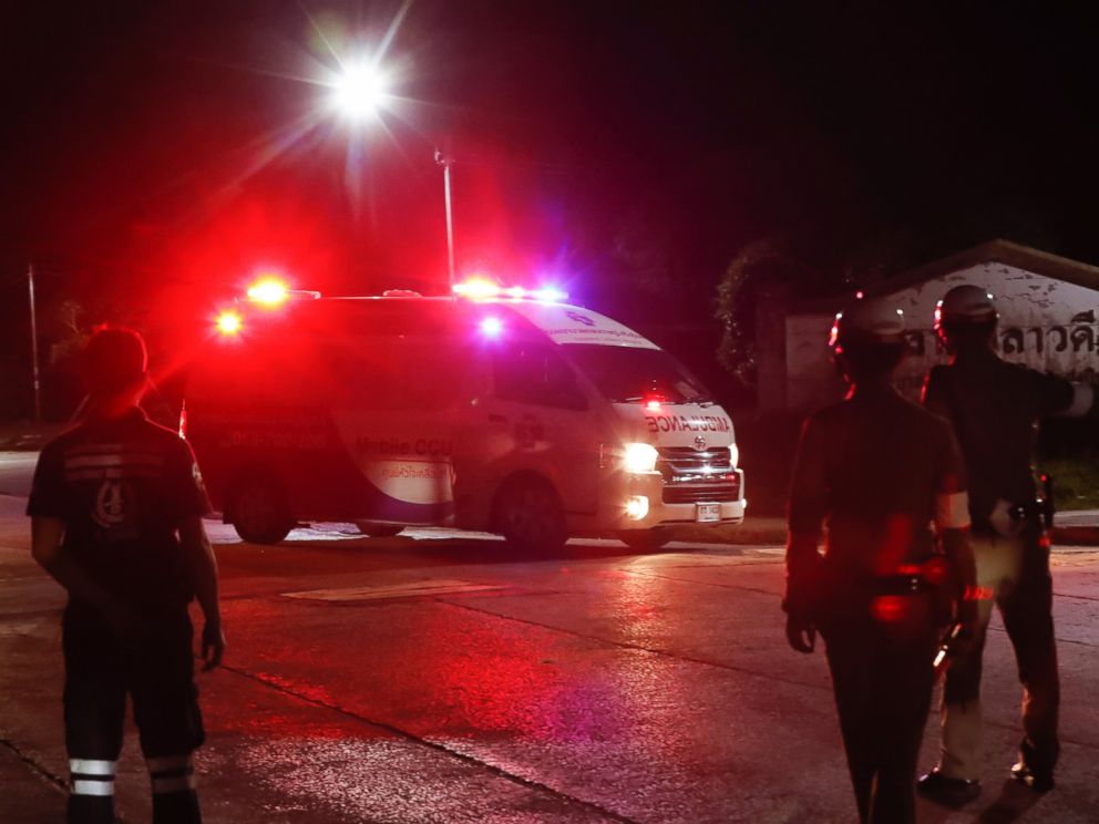 An ambulance believed to be carrying one of the rescued boys from the flooded cave heads to the hospital in Chiang Rai as divers evacuated some of the 12 boys and their coach trapped at Tham Luang cave, northern Thailand, Monday, July 9, 2018.