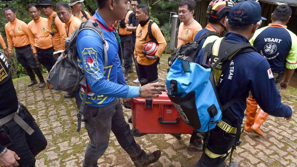 Image result for Australian divers who rescued soccer boys return to cave