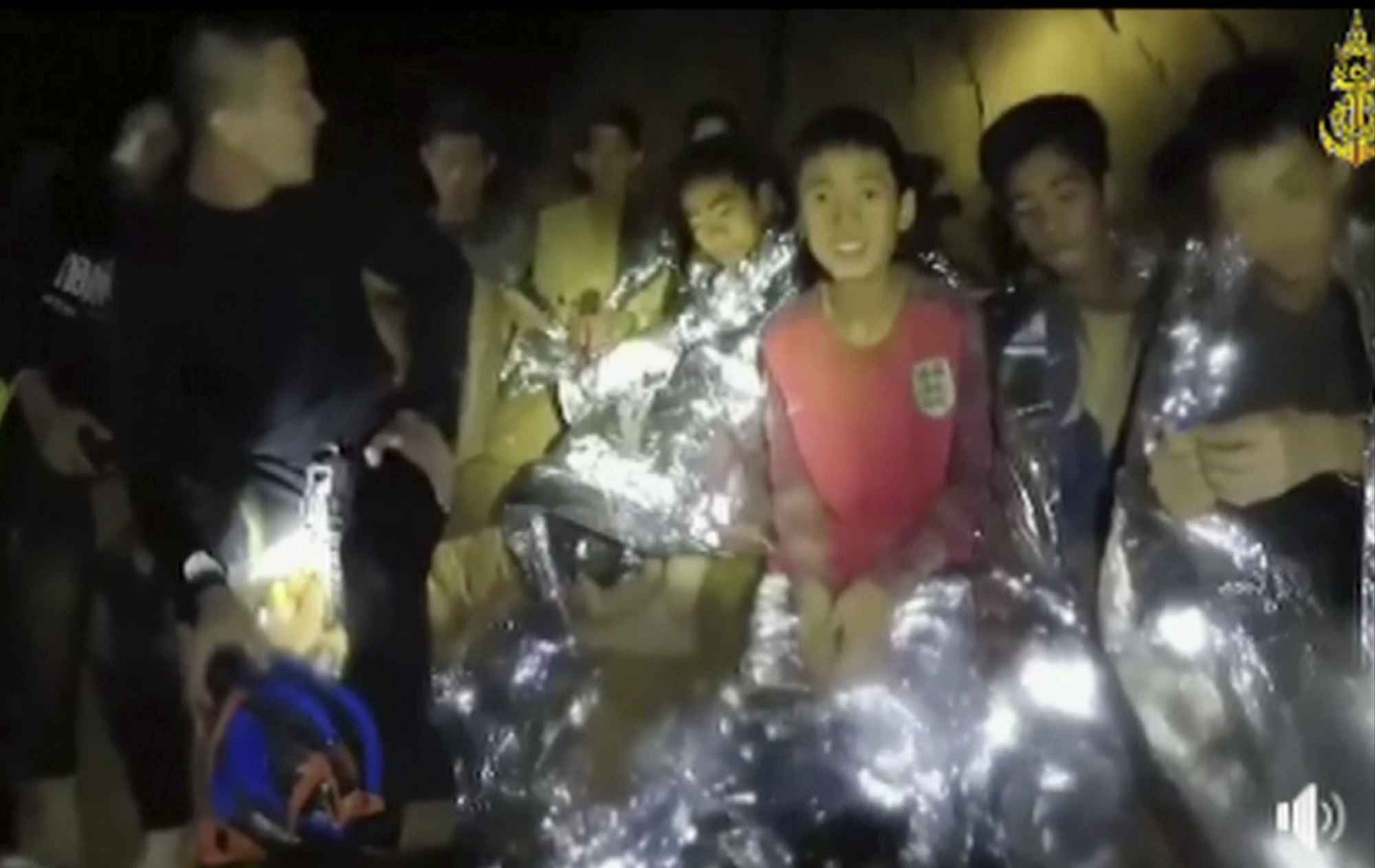 PHOTO: In this July 3, 2018, image taken from video provided by the Thai Navy Seal, Thai boys are with Navy SEALs inside the cave, Mae Sai, northern Thailand.