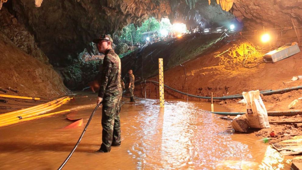 PHOTO: Thai rescue teams arrange a water pumping system at the entrance to a flooded cave complex where 12 boys and their soccer coach have been trapped since June 23, in Mae Sai, Chiang Rai province, northern Thailand in this undated photo.