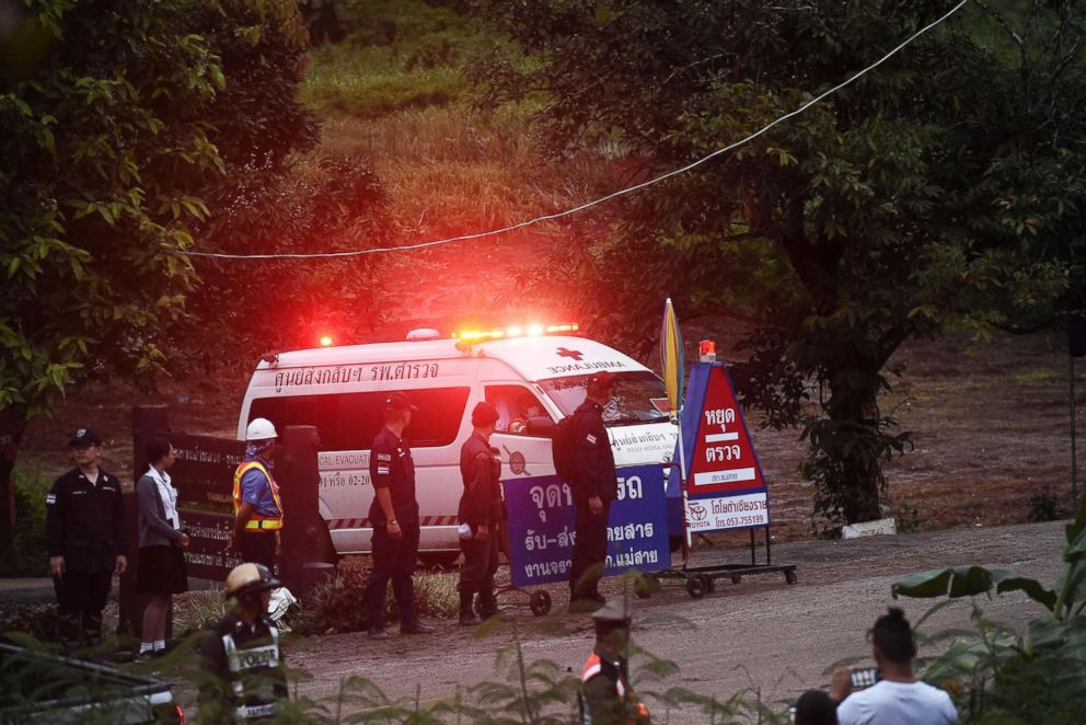 PHOTO: An ambulance leaves the Tham Luang cave area after divers evacuated some of the 12 boys and their coach trapped at the cave in Khun Nam Nang Non Forest Park in the Mae Sai district of Chiang Rai province on July 8, 2018 in Thailand.
