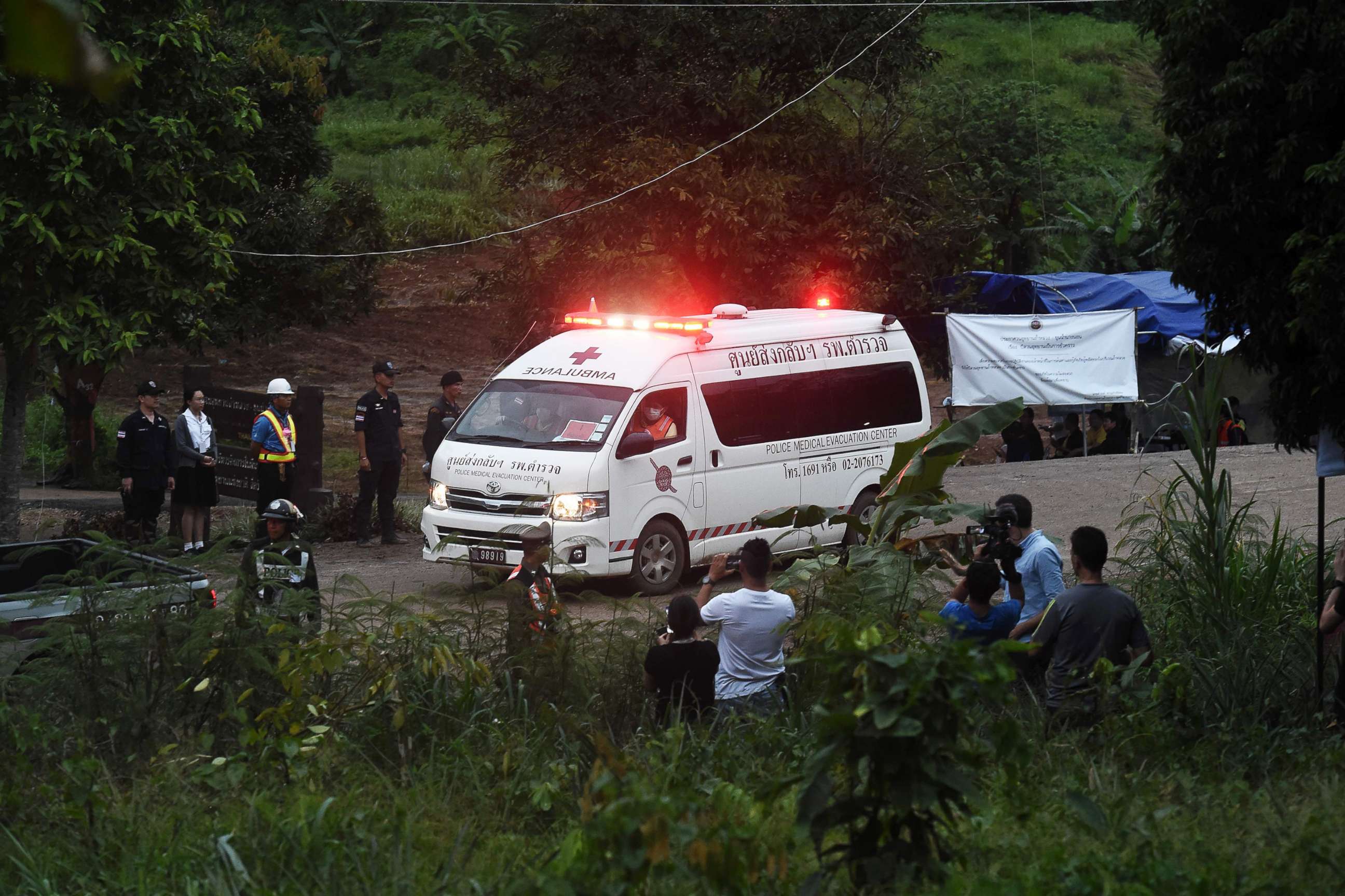 PHOTO: An ambulance leaves the Tham Luang cave area after divers evacuated some of the 12 boys and their coach trapped at the cave in Khun Nam Nang Non Forest Park in the Mae Sai district of Chiang Rai province on July 8, 2018 in Thailand.