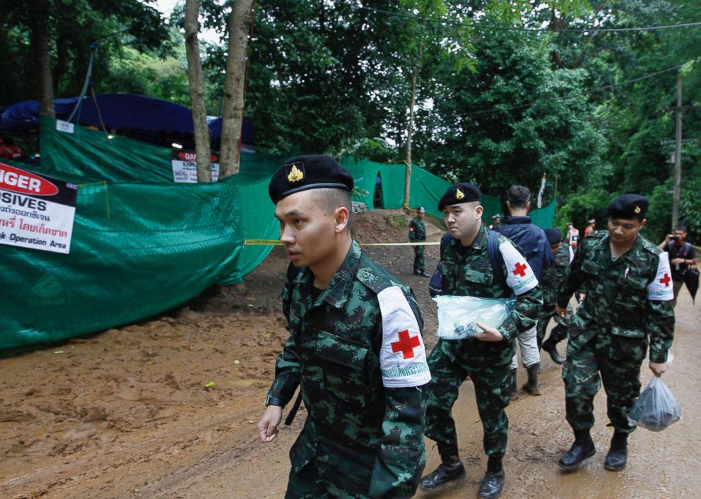 PHOTO: Thai military medical personnel take part in preparations during the ongoing rescue operation for the boys soccer team and their assistant coach to exit the cave at Tham Luang cave in Khun Nam Nang Non Forest Park, July 8, 2018 in Thailand.