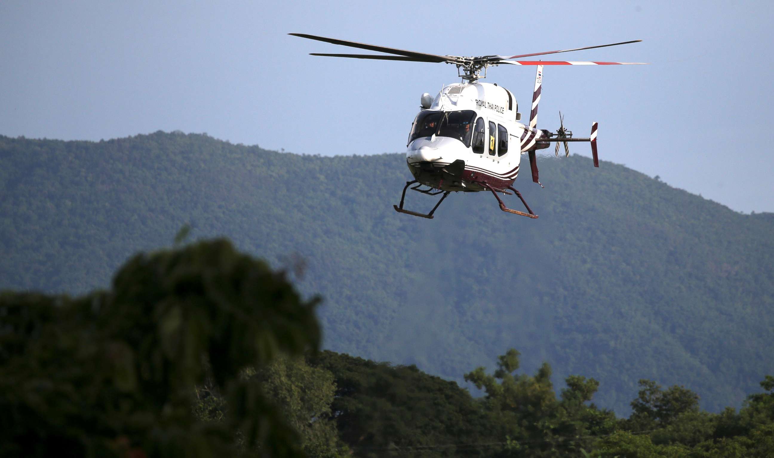PHOTO: A military helicopter carrying rescued schoolboys approaches to land at a military airport in Chiang Rai, Thailand, July 9, 2018.