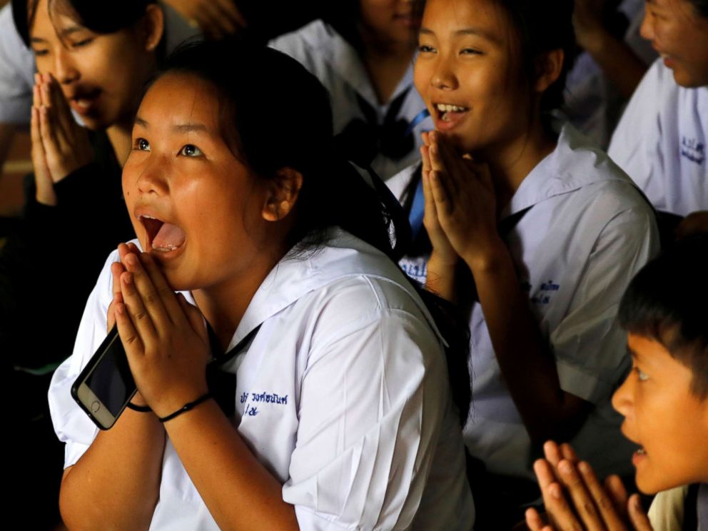 PHOTO: Classmates react after a teacher announces that some of the 12 schoolboys who were trapped inside a flooded cave, have been rescued, at Mae Sai Prasitsart school, in the northern province of Chiang Rai, Thailand, July 9, 2018.