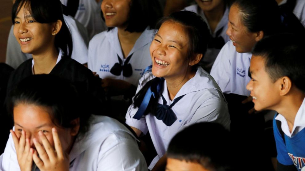 PHOTO: Classmates react after a teacher announces that some of the 12 schoolboys who were trapped inside a flooded cave, have been rescued, at Mae Sai Prasitsart school,  in the northern province of Chiang Rai, Thailand, July 9, 2018.