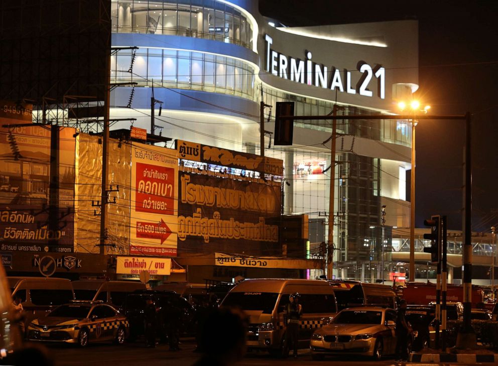 PHOTO: Thai officials on guard outside the mall, after a suspected Thai soldier opened fire in a rampage at the Terminal 21 shopping mall in Nakhon Ratchasima province, Thailand, Feb. 2020.