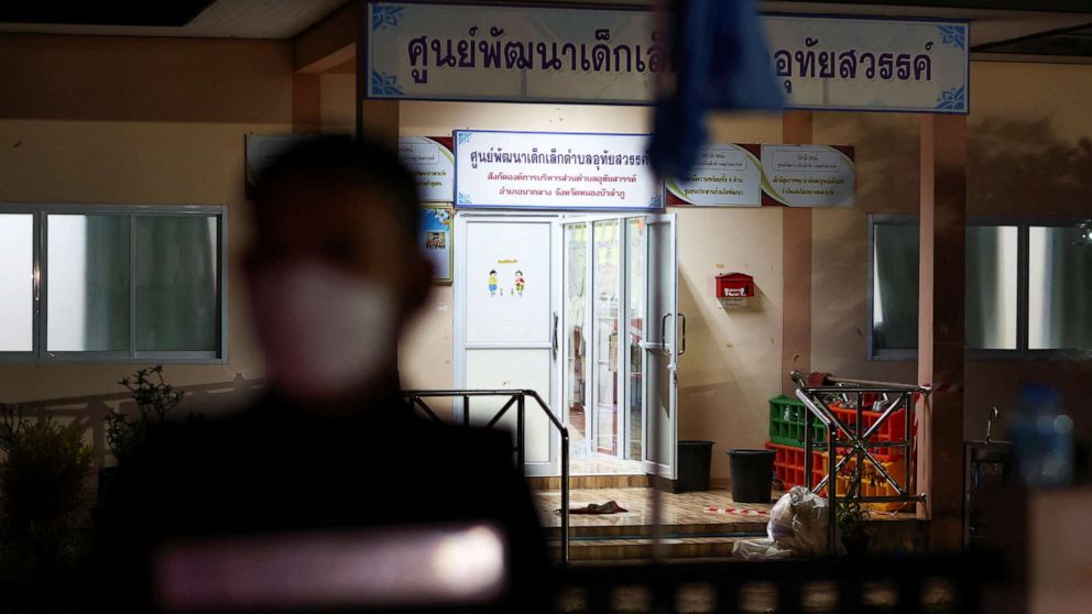 PHOTO: A police officer stands outside a day care center which was the scene of a mass shooting, in the town of Uthai Sawan, in the province of Nong Bua Lam Phu, Thailand, Oct. 6, 2022. 
