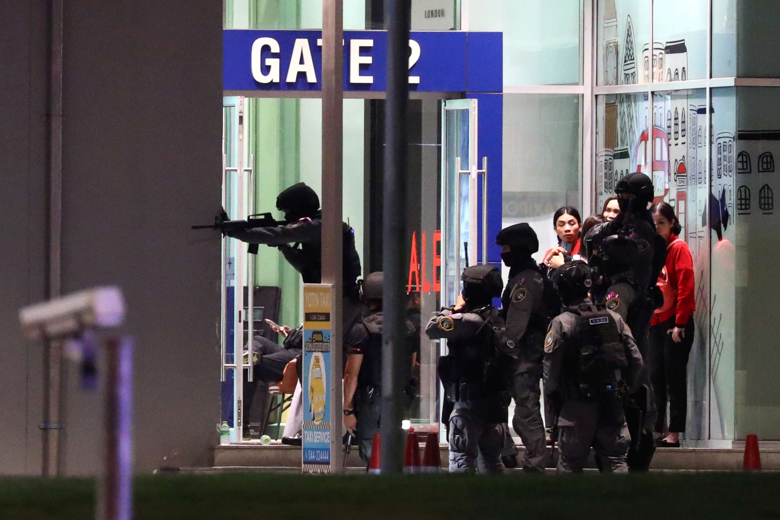 PHOTO: Thai security forces enter a shopping mall on Feb. 9, 2020, as they chase a shooter after a mass shooting in front of the Terminal 21 shopping mall in Nakhon Ratchasima, Thailand on Feb. 8.