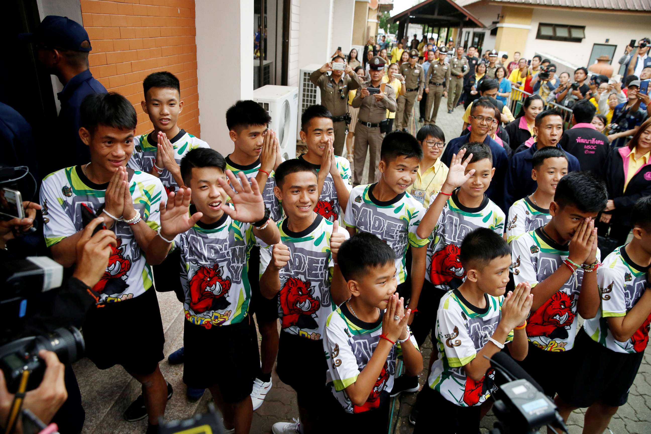 PHOTO: The 12 boys and their soccer coach who were rescued from a flooded cave arrive for a news conference in the northern province of Chiang Rai, Thailand, July 18, 2018.