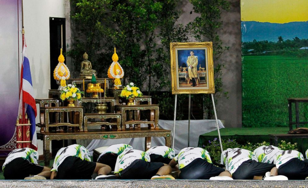 PHOTO: Thirteen rescued members of Wild Boar soccer team pay respects to a portrait of Thai King Maha Vajiralongkorn Bodindradebayavarangkun atthe Chiang Rai Provincial Administrative Organization in Chiang Rai, Thailand, July 18, 2018.